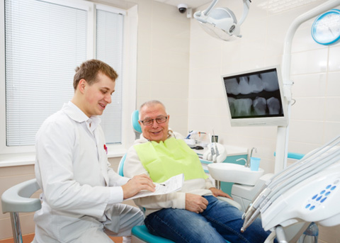 Man smiling at the dentist