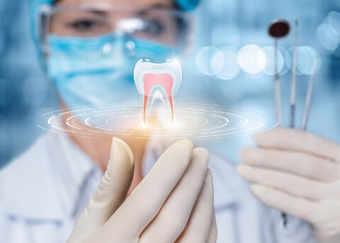 Dentist with a hologram of a tooth in their hand