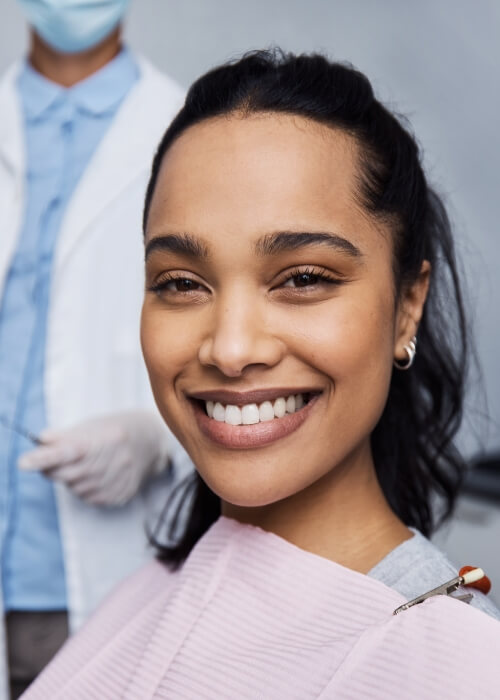 Woman grinning in dental chair
